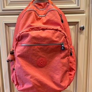 15” Kipling laptop backpack: gently worn in good condition color: Coral